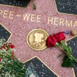 Pee Wee Herman star on Hollywood boulevard covered with roses
