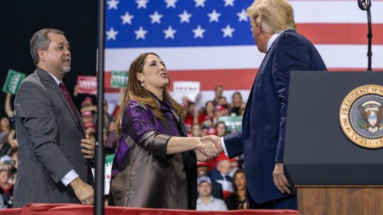 Battle Creek, Michigan / United States - December 18, 2019: President Trump with Republican National Convention Chair Ronna Romney McDaniel and Michigan Republican Party Cochair Terry Bowman