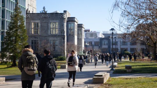 college students walk on a campus
