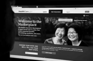 The smiling faces on screen belie the poorly executed (and poorly communicated) rollout of the Affordable Health Care Act. 