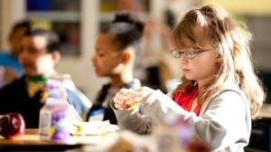A student eats breakfast at a Colorado elementary school. 
