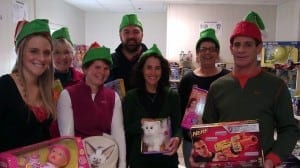 A few of the hundreds of volunteers from central Maine gathering at the Maine Children’s Home to sort gifts for deserving children who wouldn’t otherwise get anything for Christmas. 