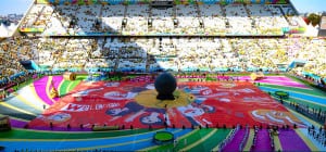 A REAL KICK: Comprised of more than 220,000 fan-submitted photos, Coca-Cola’s Happiness Flag is the world’s largest digitally produced Photomosaic Flag. The flag was produced for the 2014 FIFA World Cup.