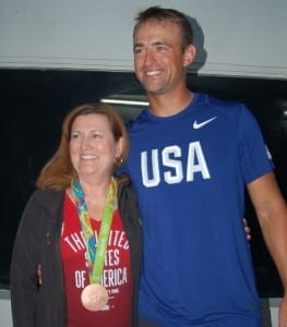 Sale Made: Sunbrella’s Gina Wicker celebrates in Rio with Caleb Paine after his bronze medal in Men’s finn. 