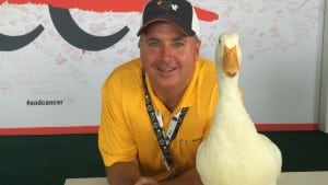 Not Mock Duck: Jon Sullivan and a live Aflac duck. Mechanized ducks soon will comfort children with cancer.