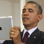 obama looking at ipad