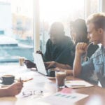 collaborating around work table