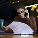 woman working on phone