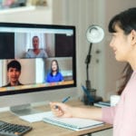 Asian woman video conferencing