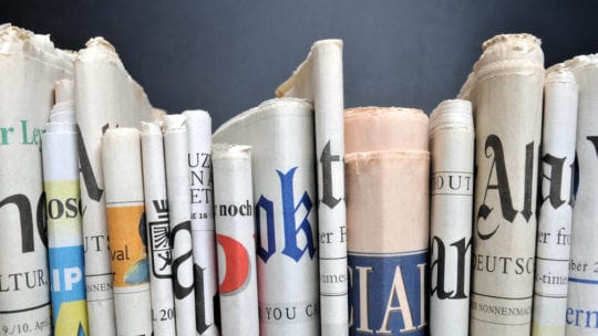 newspapers lined up