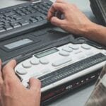 Typing on computer with Braille writer