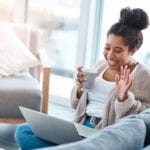 woman talks to mentor on phone