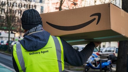 amazon worker delivering package