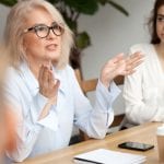 female leader in business meeting