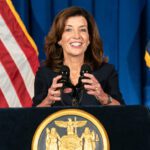kathy hochul smiling at press conference pulpit