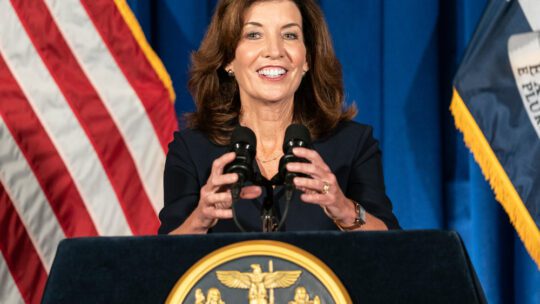 kathy hochul smiling at press conference pulpit