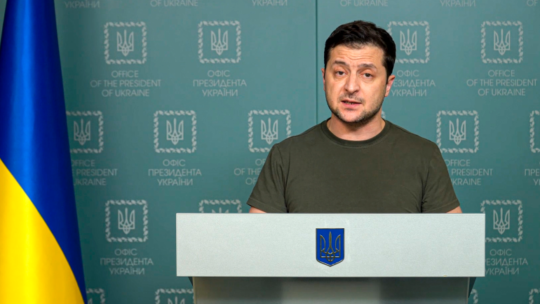 Ukrainian President Zelenskyy speaks at podium