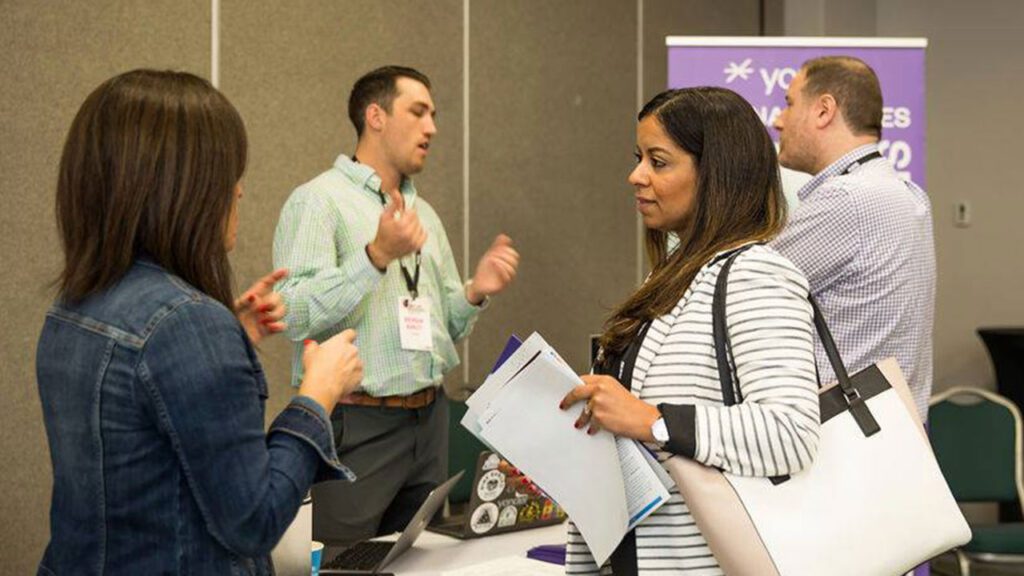 Measurement & Data Summit attendees conversing