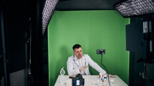 male doctor recording video for medical blog