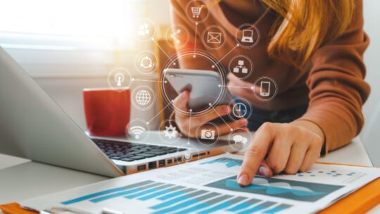 businesswoman working with smart phone and laptop and digital tablet