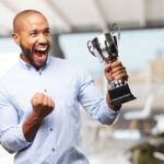 man excited about winning an award
