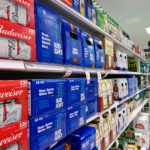 Bud Light in an aisle at the grocery store.