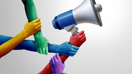 Group voice and social diversity message or diverse society speaking with one megaphone as a team communication and teamwork chat concept with 3D illustration elements.