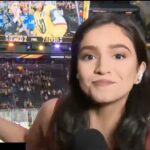 CBS Miami reporter Samantha Rivera pushes a rowdy fan out of the camera shot at the end of the Panthers Golden Knights Stanley Cup playoffs Game 2