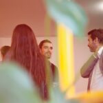 Corporate employees mingling at a reception