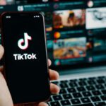 Tik Tok application icon on iPhone screen. Tiktok Social media network.
