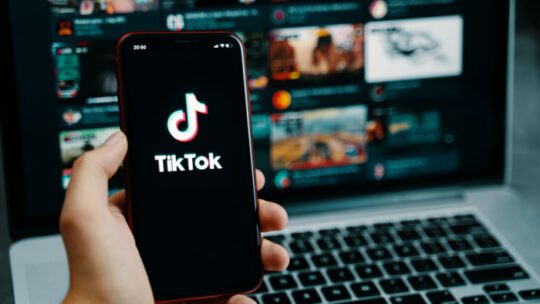 Tik Tok application icon on iPhone screen. Tiktok Social media network.