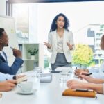 Shot of a businesswoman giving a presentation to her staff.