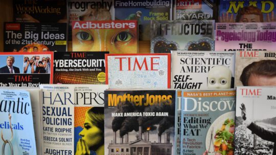 Time magazine sits in a rack in local bookstore days after layoffs announced