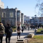 college students walk on a campus