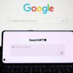 SearchGPT page seen on the smartphone screen and Google search on the background