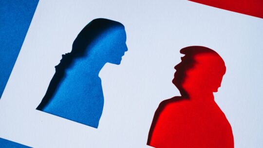 Republican vs. Democrat Rivalry Captured: Kamala Harris and Donald Trump Papercut Silhouettes in Presidential Election Colors