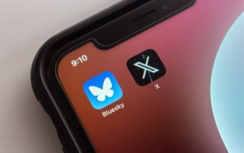 Bluesky Social and X app are displayed on an iPhone screen.