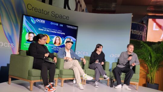 Panelists sitting on stage at CES 2025's State of the Creator Economy