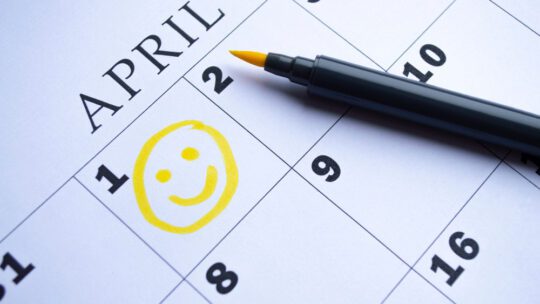The date of April 1 is circled on the calendar close up. April Fool's Day