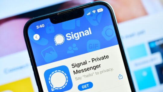 Signal app on phone, a free and open source instant messaging and calling application