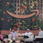 Travis and Jason Kelce talk onstage at a panel at the Amazon Port at the Cannes Festival for Creativity.