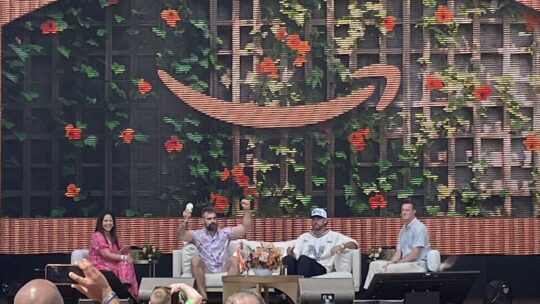 Travis and Jason Kelce talk onstage at a panel at the Amazon Port at the Cannes Festival for Creativity.