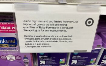 Chicago, IL, USA - June 2 2022: Bilingual signage at a Chicago Target store limits the purchase quantity of baby formula to four per guest due to the nationwide shortage.