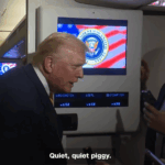 CNN screenshot of President Trump on Air Force One with the White House Press Pool saying "Quiet Piggy" to a Bloomberg reporter