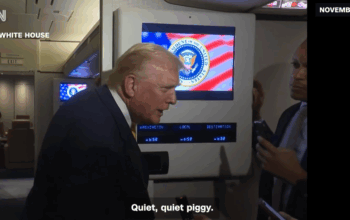 CNN screenshot of President Trump on Air Force One with the White House Press Pool saying "Quiet Piggy" to a Bloomberg reporter