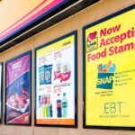 2019: Love's gas station and sign on building exterior entrance in Missouri with convenience store closeup for food stamps