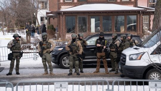 Minneapolis, Minnesota, United States. Law enforcement officers at the crime scene after ICE agent shots civilian Renee Good.