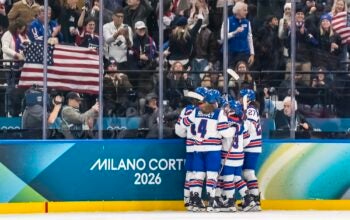 MILAN, Lombardy ITA - February 10, 2026: Team USA Celebrates after making a goal against Team Canada in the Preliminary Round Group A at the Milano Santagiulia Ice Hockey Arena in MILAN, Italy during the 2026 Milano Cortina Winter Olympics. Team USA defeats Canada, 5-0.