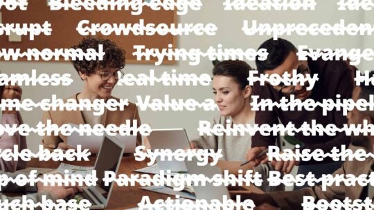 jargon words used in business presentations struck through over an image of people working on a deck