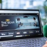 The Bear tv show title graphic showing on a laptop